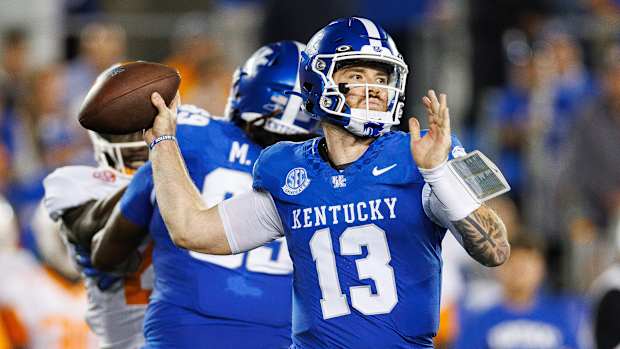 Oct 28, 2023; Lexington, Kentucky, USA; Kentucky Wildcats quarterback Devin Leary (13) passes during the second quarter against the Tennessee Volunteers at Kroger Field. Mandatory Credit: Jordan Prather-USA TODAY Sports